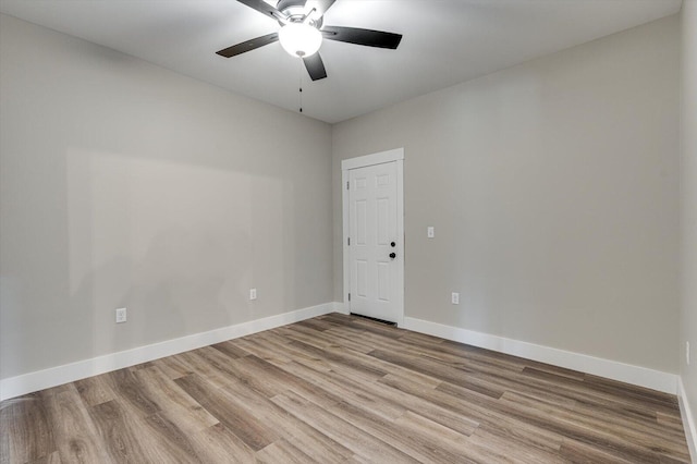 4470 Keith St NW Unit 501, Cleveland, TN 37312 - empty room with wood finished floors, ceiling fan, and baseboards