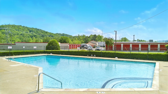 pool featuring fence
