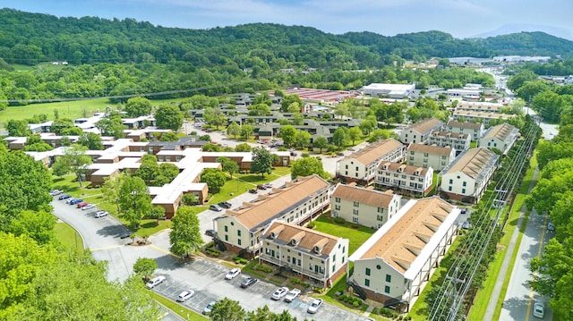 drone / aerial view with a view of trees