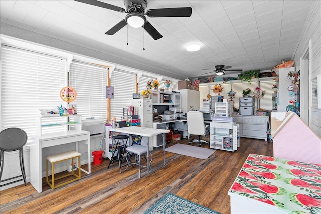 office area with ceiling fan and wood finished floors