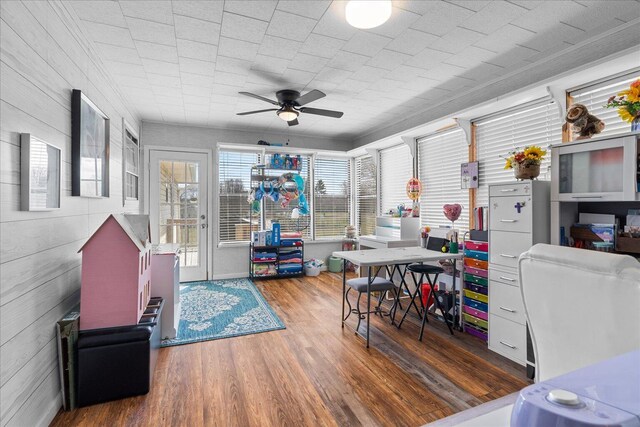 interior space featuring a ceiling fan