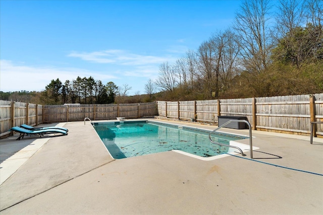 view of pool with a patio area, a fenced in pool, and a fenced backyard