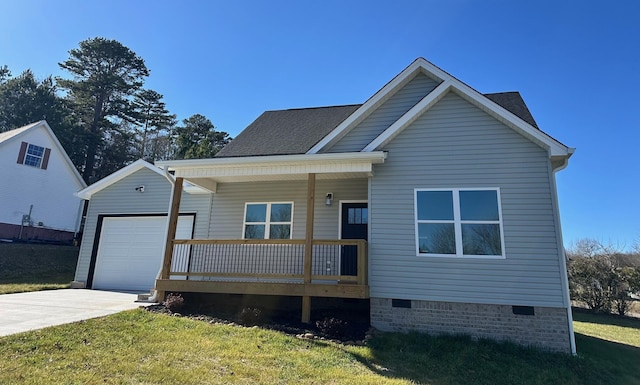 view of front of home with a porch, a garage, and a front lawn