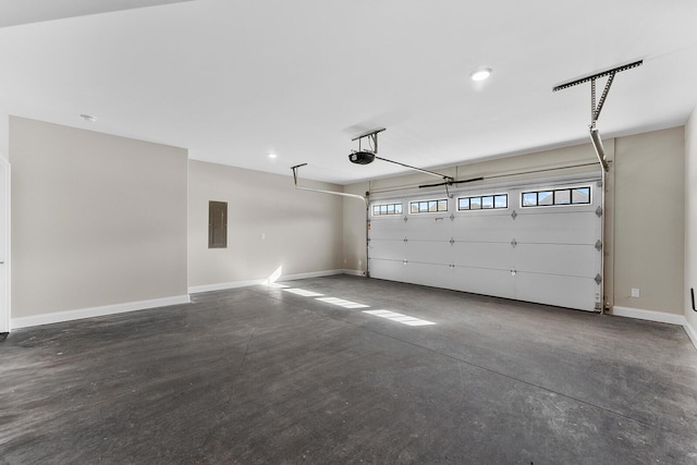 garage with recessed lighting, electric panel, a garage door opener, and baseboards