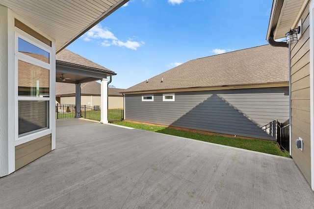 view of patio featuring fence