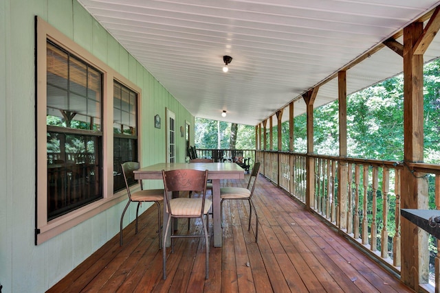 wooden terrace featuring a porch