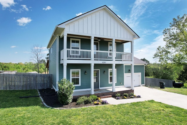 4214 Green Shanty Rd, Ooltewah, TN 37363 - view of front of house featuring a ceiling fan, covered porch, fence, concrete driveway, and a balcony