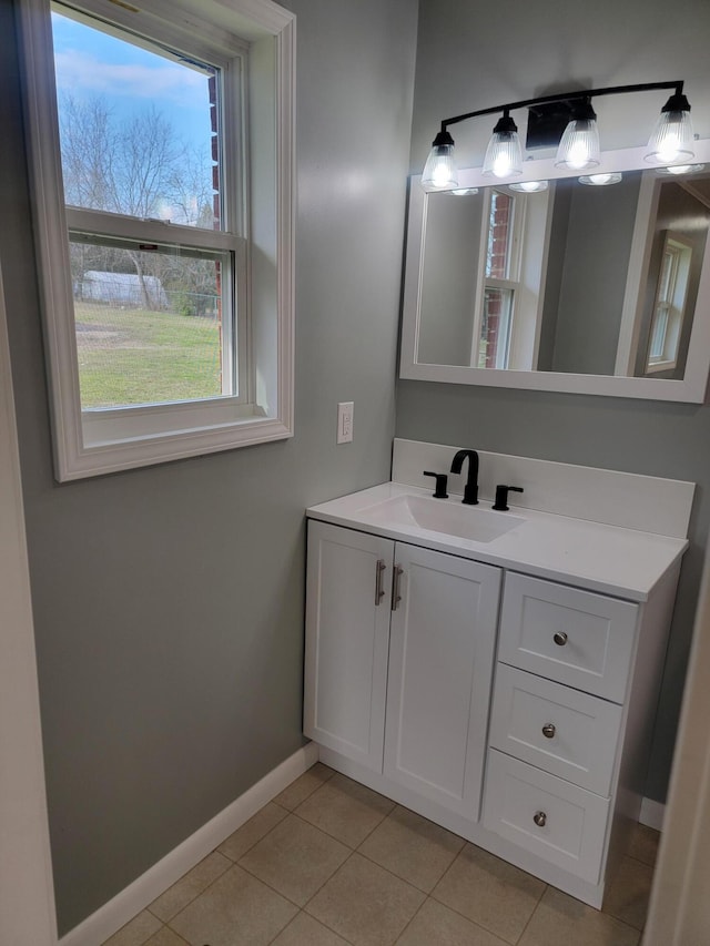 bathroom with vanity and tile patterned floors