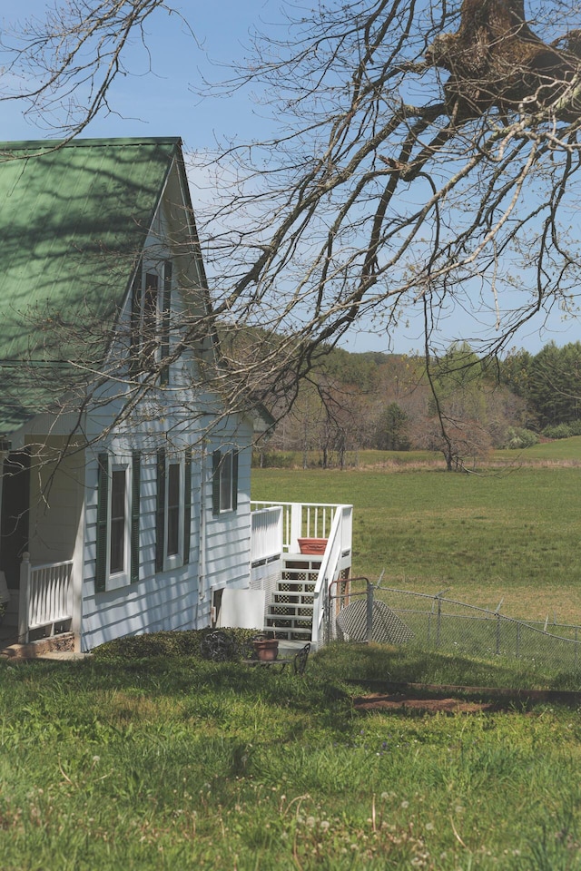 626 Brush Creek Rd, Copperhill, TN 37317 - view of home's exterior with a lawn, fence, and a deck