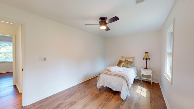 bedroom featuring ceiling fan and hardwood / wood-style floors