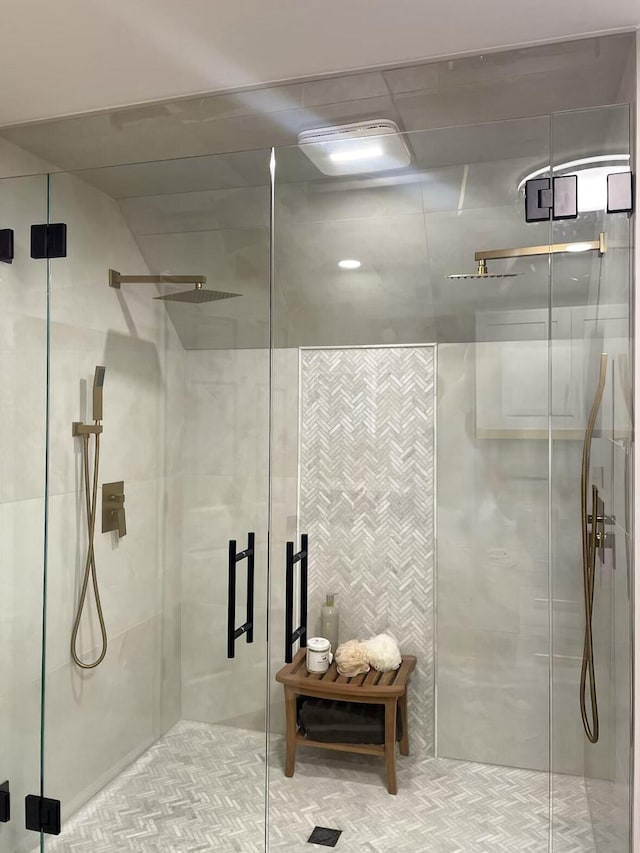 bathroom with an enclosed shower