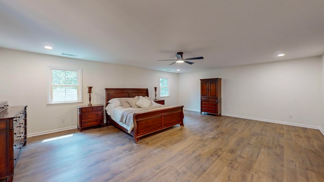 bedroom featuring ceiling fan and hardwood / wood-style floors