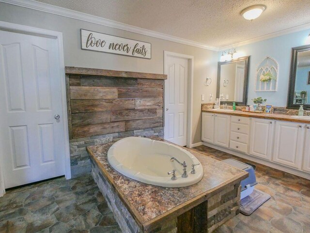 bathroom featuring a bath, a stall shower, a textured ceiling, and crown molding