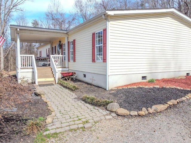 view of side of property with crawl space