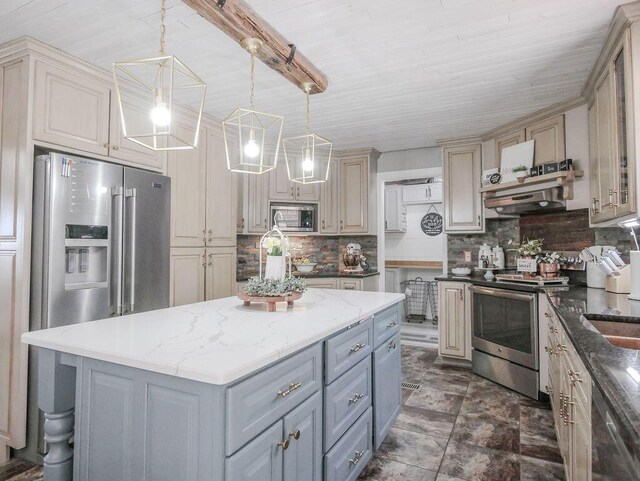 kitchen featuring a kitchen island, gray cabinets, decorative backsplash, hanging light fixtures, and appliances with stainless steel finishes