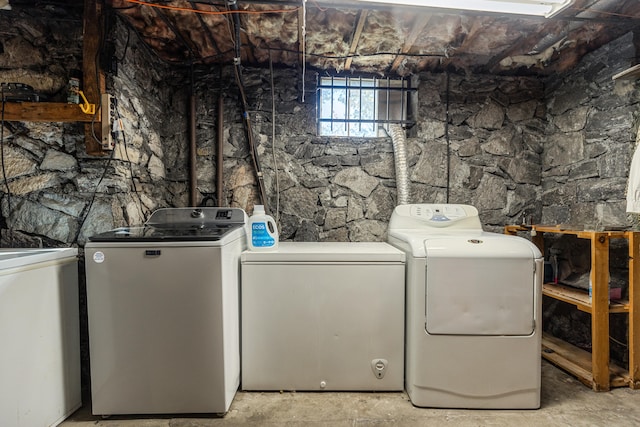 washroom featuring independent washer and dryer