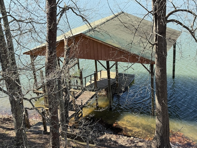 dock area featuring a water view