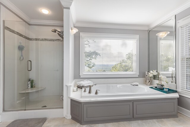 bathroom with separate shower and tub, crown molding, and tile patterned floors