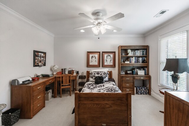 carpeted bedroom featuring ceiling fan and ornamental molding