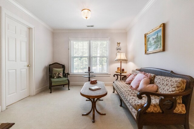 living area featuring crown molding and light carpet