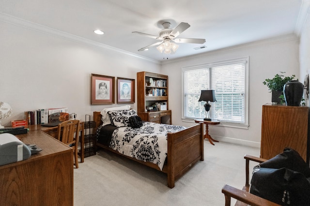 carpeted bedroom with ceiling fan and crown molding