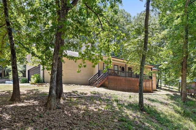 6300 Davis Hill Rd, Harrison, TN 37341 - rear view of property featuring stairway, a deck, and a garage