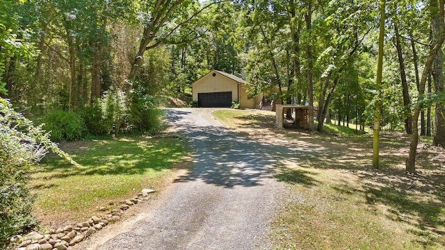 6300 Davis Hill Rd, Harrison, TN 37341 - obstructed view of property with driveway and an outbuilding
