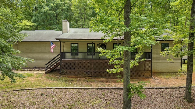 6300 Davis Hill Rd, Harrison, TN 37341 - view of front of house with stairway, covered porch, and a chimney