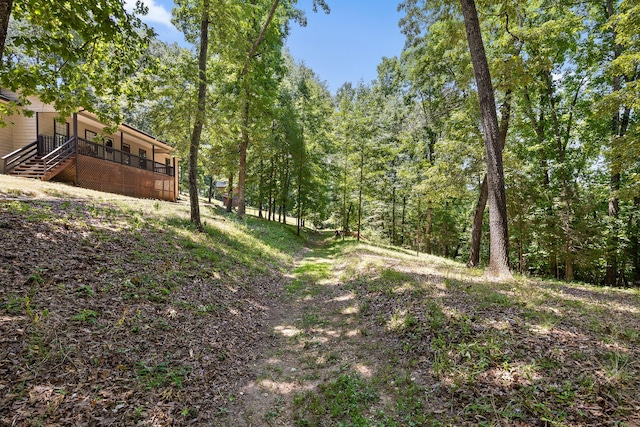 6300 Davis Hill Rd, Harrison, TN 37341 - view of yard featuring a deck and a view of trees