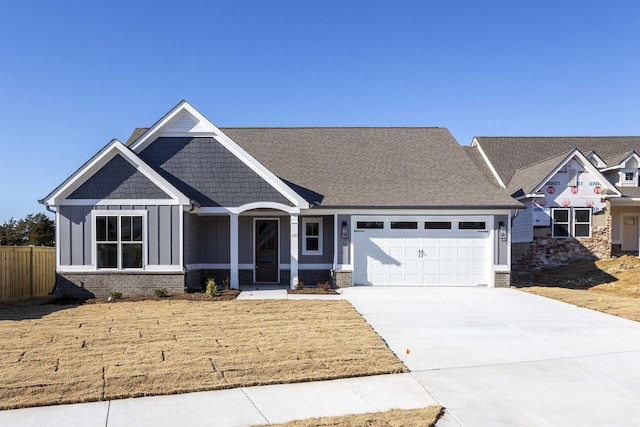 craftsman-style house featuring a garage