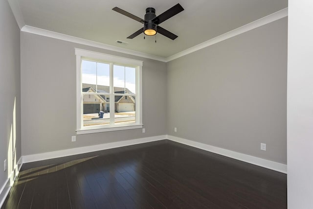 empty room with dark wood-type flooring, crown molding, and ceiling fan