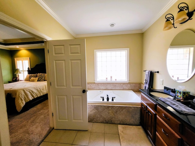 bathroom with a relaxing tiled tub, vanity, tile patterned floors, and ornamental molding