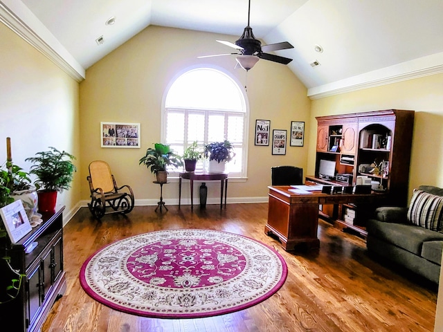 office space featuring crown molding, ceiling fan, lofted ceiling, and dark hardwood / wood-style flooring