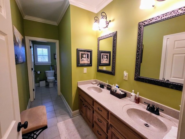 bathroom with vanity, ornamental molding, tile patterned floors, and toilet