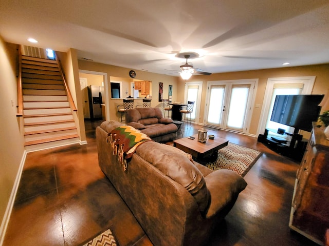 living room featuring ceiling fan