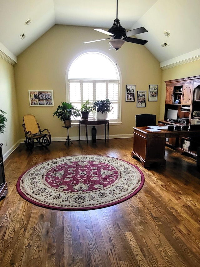 office space with vaulted ceiling, dark wood-type flooring, and ceiling fan