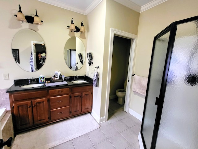 bathroom with ornamental molding, tile patterned floors, and vanity