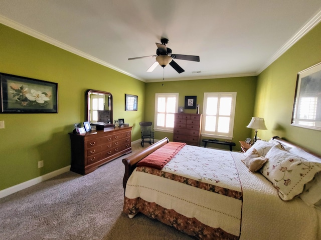 carpeted bedroom with ornamental molding and ceiling fan