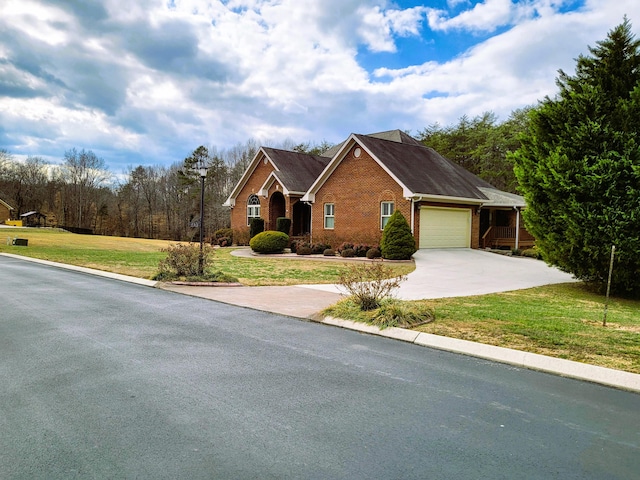 view of front facade with a garage and a front yard