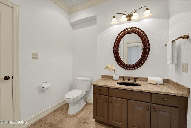 bathroom featuring tile patterned flooring, vanity, and toilet