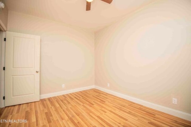 unfurnished room featuring light hardwood / wood-style floors and ceiling fan