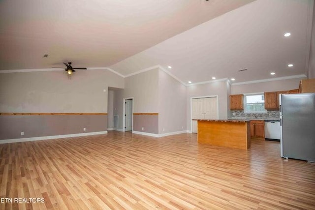 unfurnished living room featuring ceiling fan, light wood-type flooring, ornamental molding, and lofted ceiling