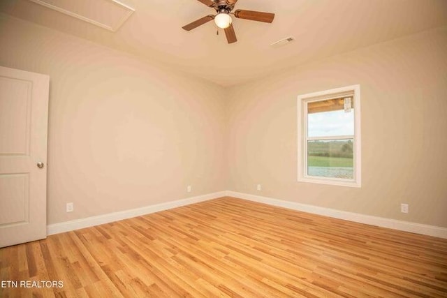 unfurnished room featuring ceiling fan and light hardwood / wood-style flooring