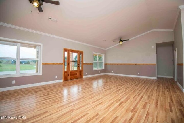 unfurnished living room with ornamental molding, light hardwood / wood-style floors, ceiling fan, and lofted ceiling