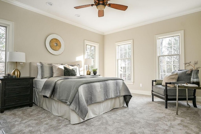 bedroom featuring ornamental molding, light carpet, and multiple windows