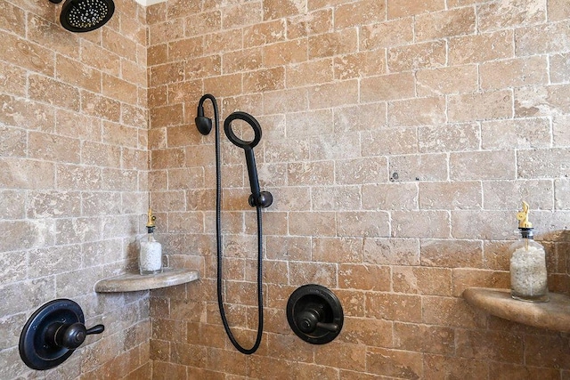 room details with a tile shower