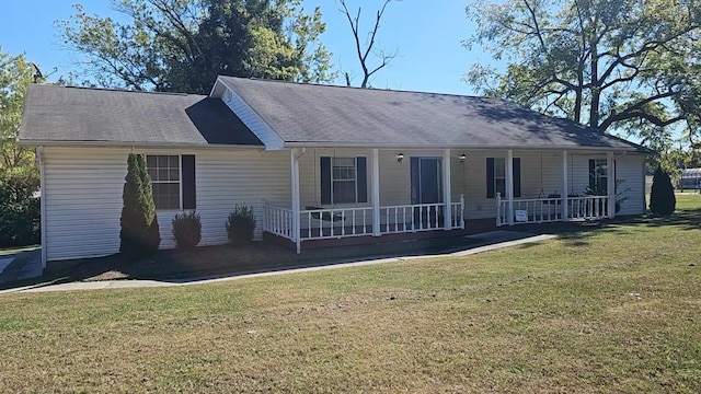 single story home featuring a porch and a front yard