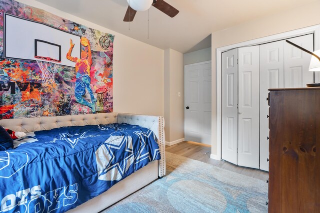 364 Hidden Oaks Trl, Cleveland, TN 37312 - bedroom with wood finished floors, a ceiling fan, and a closet