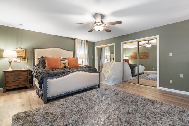 364 Hidden Oaks Trl, Cleveland, TN 37312 - bedroom with two closets, wood finished floors, and a ceiling fan