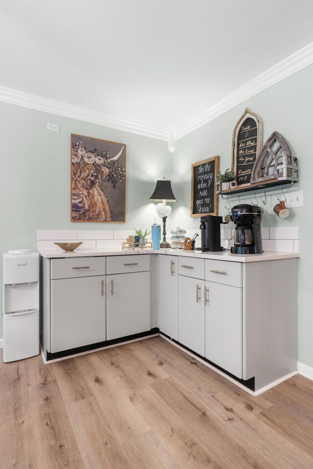 364 Hidden Oaks Trl, Cleveland, TN 37312 - bar featuring ornamental molding and light wood finished floors